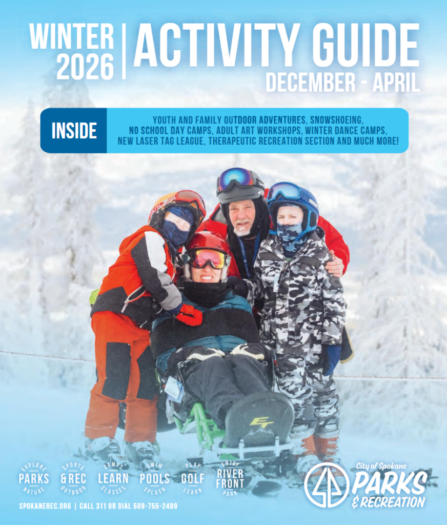 Front cover of the 2026 Winter Activity Guide featuring a family of 4 posing for a photo while skiing.